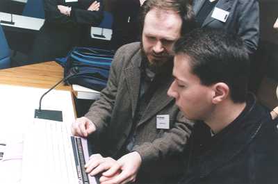 Picture of Matio Batusic from the University of Linz, Computer
Science for the Blind, showing the adaptive equipment to Dimos Zacharos, student of the Applied Informatics Department.